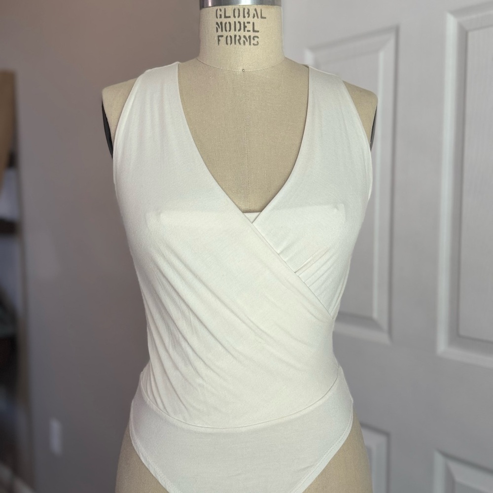 Final Touch Cream Sleeveless Wrap Bodysuit